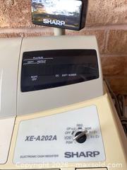 MaxSold Auction: Sharp XE-A202A Electronic Cash Register with Drawer, Display, Manual & Key - Smiths Falls (Ontario, Canada) SELLER MANAGED Reseller Online Auction -  Autumn Drive