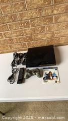 MaxSold Auction: Sony PlayStation 3 Slim Console with Camo DualShock 3 + Cables - Smiths Falls (Ontario, Canada) SELLER MANAGED Reseller Online Auction -  Autumn Drive