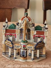 MaxSold Auction: Lemax Christmas Village Porcelain Light House Old Pacific Theater 8" H x 8" L x 5" D Working in original box - Ajax (Ontario, Canada) SELLER MANAGED Estate Sale Online Auction - Billingsgate Crescent