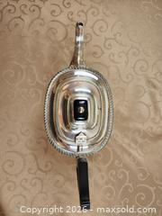 MaxSold Auction: Silver plated teapot with black hand and lid  - Ajax (Ontario, Canada) SELLER MANAGED Estate Sale Online Auction - Billingsgate Crescent