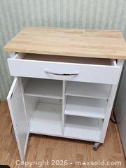 MaxSold Auction: White Kitchen Island on Wheels with Lock 17.25"D x 29"W x 35.5"T - Ajax (Ontario, Canada) SELLER MANAGED Estate Sale Online Auction - Billingsgate Crescent