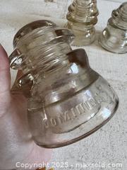 MaxSold Auction: Vintage Mixed Set of Dominion Glass Insulators - Vintage Glass Insulator Lot of Three - Kingston (Ontario, Canada) SELLER MANAGED Downsizing Online Auction - Bishop Street