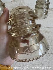 MaxSold Auction: Vintage Mixed Set of Dominion Glass Insulators - Vintage Glass Insulator Lot of Three - Kingston (Ontario, Canada) SELLER MANAGED Downsizing Online Auction - Bishop Street