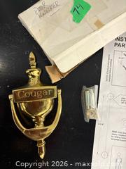 MaxSold Auction: COUGAR door knocker ~NEW - Kingston (Ontario, Canada) SELLER MANAGED Downsizing Online Auction - Steve Fonyo Drive (STORAGE)