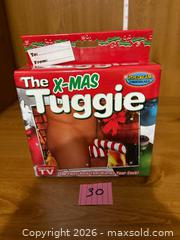 MaxSold Auction: NEW ~ The X-Mas Tuggie  - Kingston (Ontario, Canada) SELLER MANAGED Downsizing Online Auction - Steve Fonyo Drive (STORAGE)