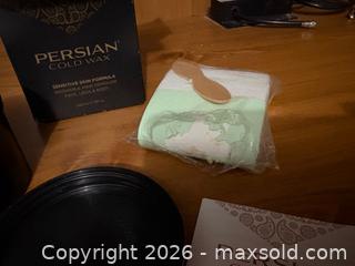 MaxSold Auction: Rose Facial Oil & Persian Cold Wax - Kingston (Ontario, Canada) SELLER MANAGED Downsizing Online Auction - Steve Fonyo Drive (STORAGE)