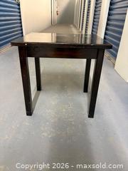 MaxSold Auction: Small black end table - Kingston (Ontario, Canada) SELLER MANAGED Downsizing Online Auction - Steve Fonyo Drive (STORAGE)