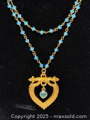 MaxSold Auction: Delicate Blue Gemstone Necklace with Heart Pendant  - Toronto (Ontario, Canada) PARTNER MANAGED Estate Sale Online Auction -  Glen Road