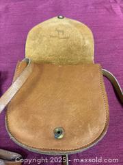 MaxSold Auction: Michael Kors Tan Saffiano-Style Leather Phone Wallet with MK Clasp - Renfrew (Ontario, Canada) SELLER MANAGED Downsizing Online Auction - Plaunt Street South