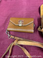 MaxSold Auction: Michael Kors Tan Saffiano-Style Leather Phone Wallet with MK Clasp - Renfrew (Ontario, Canada) SELLER MANAGED Downsizing Online Auction - Plaunt Street South