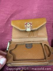 MaxSold Auction: Michael Kors Tan Saffiano-Style Leather Phone Wallet with MK Clasp - Renfrew (Ontario, Canada) SELLER MANAGED Downsizing Online Auction - Plaunt Street South
