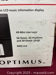 MaxSold Auction: Optimus 49-Key Portable Electronic Keyboard (Mini Keys) - Renfrew (Ontario, Canada) SELLER MANAGED Downsizing Online Auction - Plaunt Street South
