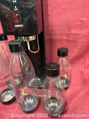 MaxSold Auction: SodaStream Soda Maker with Bottles (lot) - Renfrew (Ontario, Canada) SELLER MANAGED Downsizing Online Auction - Plaunt Street South