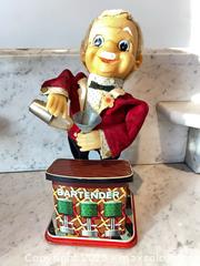 MaxSold Auction: Vintage Tin Battery-Operated Smoking Bartender Toy - Kingston (Ontario, Canada) SELLER MANAGED Downsizing Online Auction - College Street