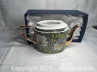 MaxSold Auction: Lidded Ceramic Teapot with Lid - Floral Blue/Green/Yellow - Toronto (Ontario, Canada) SELLER MANAGED Estate Sale Online Auction - Esander Drive (STORAGE)