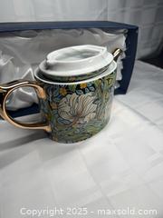 MaxSold Auction: Lidded Ceramic Teapot with Lid - Floral Blue/Green/Yellow - Toronto (Ontario, Canada) SELLER MANAGED Estate Sale Online Auction - Esander Drive (STORAGE)
