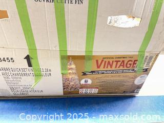 MaxSold Auction: Silver Tinsel Artificial Christmas Tree with Lights and Stand - Toronto (Ontario, Canada) SELLER MANAGED Estate Sale Online Auction - Esander Drive (STORAGE)