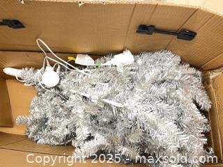 MaxSold Auction: Silver Tinsel Artificial Christmas Tree with Lights and Stand - Toronto (Ontario, Canada) SELLER MANAGED Estate Sale Online Auction - Esander Drive (STORAGE)
