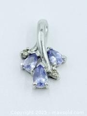 MaxSold Auction: 10k White Gold - “ADL” Tanzanite Pendant  - Esquimalt (British Columbia, Canada) SELLER MANAGED Estate Sale Online Auction -  Lampson Street