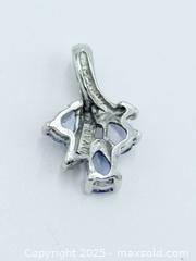 MaxSold Auction: 10k White Gold - “ADL” Tanzanite Pendant  - Esquimalt (British Columbia, Canada) SELLER MANAGED Estate Sale Online Auction -  Lampson Street