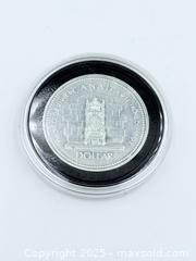 MaxSold Auction: Canadian Silver Dollar 1977 - Esquimalt (British Columbia, Canada) SELLER MANAGED Estate Sale Online Auction -  Lampson Street