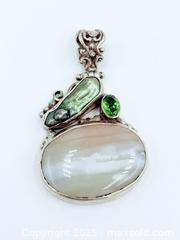 MaxSold Auction: Mother of Pearl Peridot 925 Sterling Silver Pendant  - Esquimalt (British Columbia, Canada) SELLER MANAGED Estate Sale Online Auction -  Lampson Street