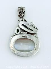 MaxSold Auction: Mother of Pearl Peridot 925 Sterling Silver Pendant  - Esquimalt (British Columbia, Canada) SELLER MANAGED Estate Sale Online Auction -  Lampson Street