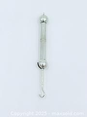 MaxSold Auction: Silver Button Hook Pendant  - Esquimalt (British Columbia, Canada) SELLER MANAGED Estate Sale Online Auction -  Lampson Street