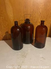 MaxSold Auction: 3 large antique bottles - Merrickville-Wolford (Ontario, Canada) SELLER MANAGED Downsizing Online Auction - Rideau Street