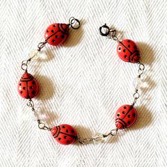 MaxSold Auction: Sterling Silver Red Lady Bug Bead Bracelet - Ottawa (Ontario, Canada) SELLER MANAGED Downsizing Online Auction - Barrie Avenue
