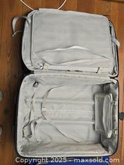 MaxSold Auction: Lot of (2) Blue Rolling Suitcases – Large & Carry-On - San Francisco (California, USA) PARTNER MANAGED Estate Sale Online Auction - 10th Street (CONDO)