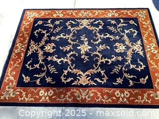 MaxSold Auction: Navy and Rust Wool Rug, 7’ x 9’ - Port Townsend (Washington, USA) SELLER MANAGED Estate Sale Online Auction - 19th Street (STORAGE)