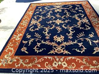 MaxSold Auction: Navy and Rust Wool Rug, 7’ x 9’ - Port Townsend (Washington, USA) SELLER MANAGED Estate Sale Online Auction - 19th Street (STORAGE)