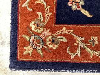 MaxSold Auction: Navy and Rust Wool Rug, 7’ x 9’ - Port Townsend (Washington, USA) SELLER MANAGED Estate Sale Online Auction - 19th Street (STORAGE)