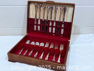 MaxSold Auction: 1847 Rogers Bros “Reflection” Silverplate Flatware Set with Wooden Storage Chest - New Westminster (British Columbia, Canada) SELLER MANAGED Reseller Online Auction - Columbia Street