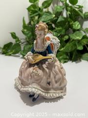 MaxSold Auction:  A Vintage Porcelain Victorian Lady Figurines - New Westminster (British Columbia, Canada) SELLER MANAGED Reseller Online Auction - Columbia Street