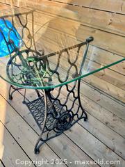 MaxSold Auction: Antique Singer Sewing Machine Base Custom Glass Top Table  - Toronto (Ontario, Canada) PARTNER MANAGED Downsizing Online Auction - Scarborough Road