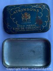 MaxSold Auction: Atkinson’s Gold Medal Eau de Cologne Solidified Brilliantine Tin w/ Curved interior. - Kingston (Ontario, Canada) SELLER MANAGED Estate Sale Online Auction - Monterey Court