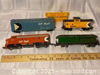 MaxSold Auction: Box of Old Model Trains, track, and Power Pack incl. Engine &#38; Caboose - Kingston (Ontario, Canada) SELLER MANAGED Estate Sale Online Auction - Monterey Court