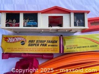 MaxSold Auction: Large selection of Hot Wheels Track and Accessories incl. battery operated “Super Charger” - Kingston (Ontario, Canada) SELLER MANAGED Estate Sale Online Auction - Monterey Court