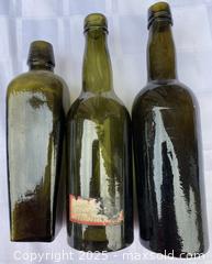 MaxSold Auction: Smaller Very Old Early glass bottles estimated around 1880 to 1890.  - Kingston (Ontario, Canada) SELLER MANAGED Estate Sale Online Auction - Monterey Court