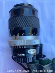 MaxSold Auction: Telephoto lens for Nikon F camera. With soft case. Made in Japan.  - Kingston (Ontario, Canada) SELLER MANAGED Estate Sale Online Auction - Monterey Court