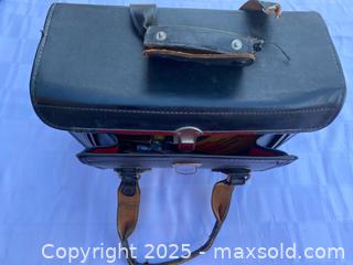 MaxSold Auction: Vintage Leather Camera carry case with many accessories - Kingston (Ontario, Canada) SELLER MANAGED Estate Sale Online Auction - Monterey Court