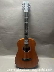 MaxSold Auction: Baby Taylor Guitar  - Toronto (Ontario, Canada) SELLER MANAGED Downsizing Online Auction -  Balmoral Avenue