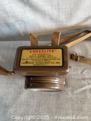 MaxSold Auction: Chestlite Metal Tin with Cloth Straps and Paper Label - Toronto (Ontario, Canada) SELLER MANAGED Reseller Online Auction - Weston Road (CONDO)