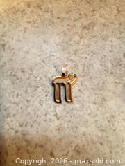 MaxSold Auction: 10k yellow gold Chai pendant - Ottawa (Ontario, Canada) SELLER MANAGED Downsizing Online Auction - Jeanne Darc Boulevard North