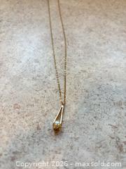 MaxSold Auction: 10k yellow gold chain with caged pearl pendant  - Ottawa (Ontario, Canada) SELLER MANAGED Downsizing Online Auction - Jeanne Darc Boulevard North