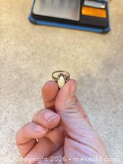 MaxSold Auction: Vintage gold ring featuring a marquise-shaped opal  - Ottawa (Ontario, Canada) SELLER MANAGED Downsizing Online Auction - Jeanne Darc Boulevard North