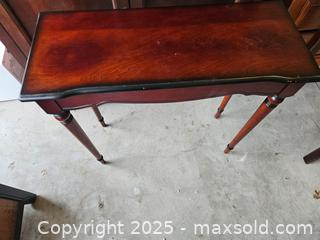MaxSold Auction: Narrow Wood Console/Entryway Table, Reddish-Brown w/ Black Edging - Chesapeake (Virginia, USA) PARTNER MANAGED Downsizing Online Auction - River Arch Drive