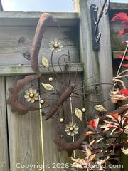 MaxSold Auction: Decorative Metal Butterfly Wall Art - Rust Brown with Floral Accents - Hamilton (Ontario, Canada) SELLER MANAGED Downsizing Online Auction - Cameron Avenue South